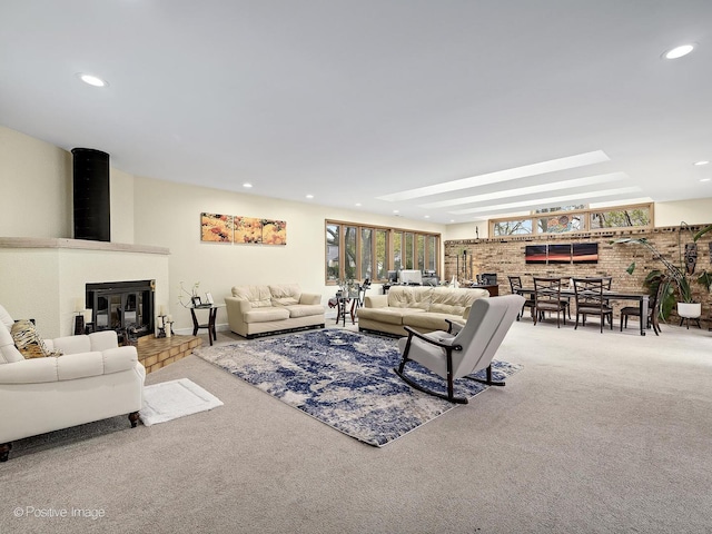carpeted living area featuring recessed lighting