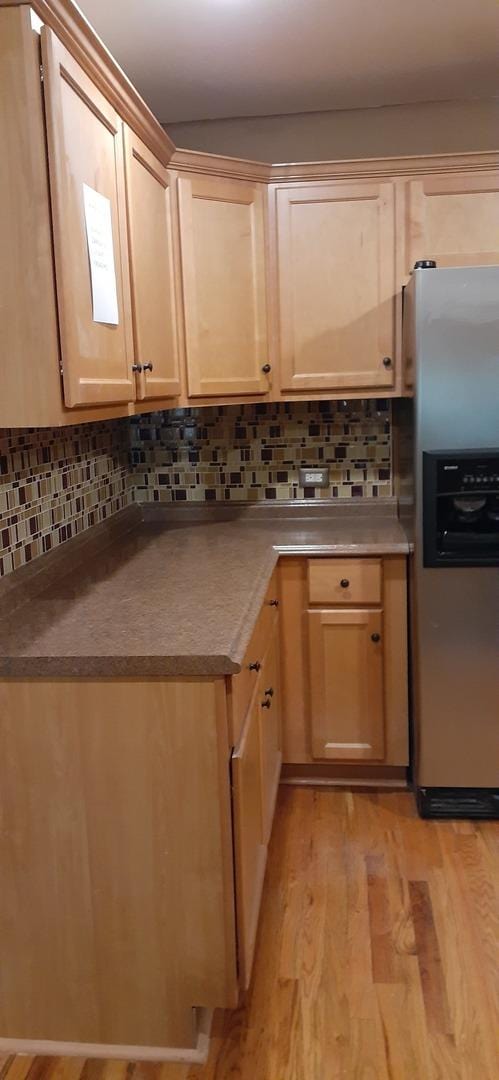 15831 Dante Dr, South Holland, IL 60473 - kitchen with stainless steel fridge with ice dispenser, decorative backsplash, light wood-style flooring, and light brown cabinets
