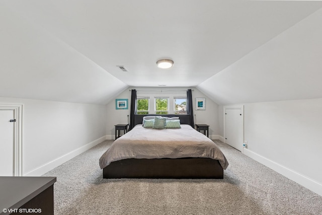 6317 W Roscoe St, Chicago, IL 60634 - bedroom with lofted ceiling and carpet floors