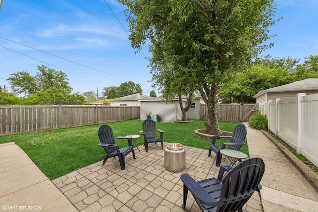 6317 W Roscoe St, Chicago, IL 60634 - fenced backyard featuring a patio area, an outbuilding, and a fire pit