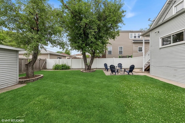 6317 W Roscoe St, Chicago, IL 60634 - fenced backyard with an outdoor fire pit