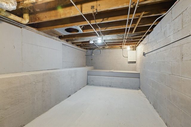 unfinished below grade area featuring electric panel