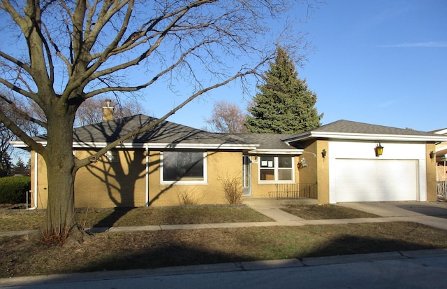 ranch-style home with concrete driveway, a chimney, stucco siding, a shingled roof, and a garage