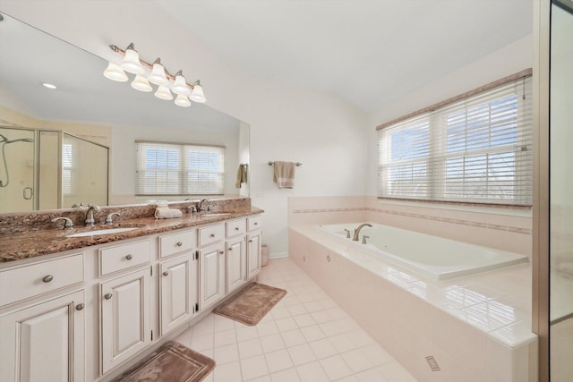 full bath featuring tile patterned floors, a sink, a shower stall, a bath, and double vanity