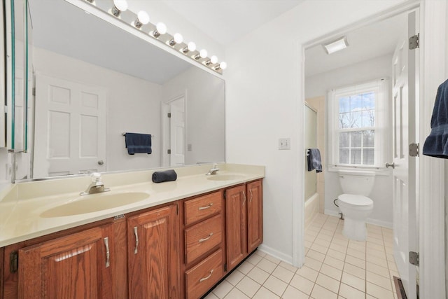 full bath with bathtub / shower combination, toilet, a sink, tile patterned flooring, and double vanity