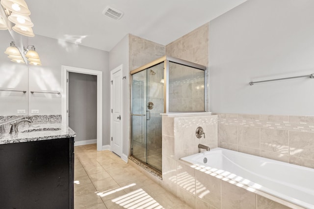 104 W Kennedy Ln, Hinsdale, IL 60521 - full bath featuring a shower stall, a bath, double vanity, and baseboards