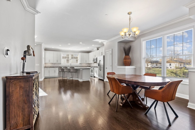 104 W Kennedy Ln, Hinsdale, IL 60521 - dining space with a chandelier, dark wood-style flooring, ornamental molding, recessed lighting, and baseboards
