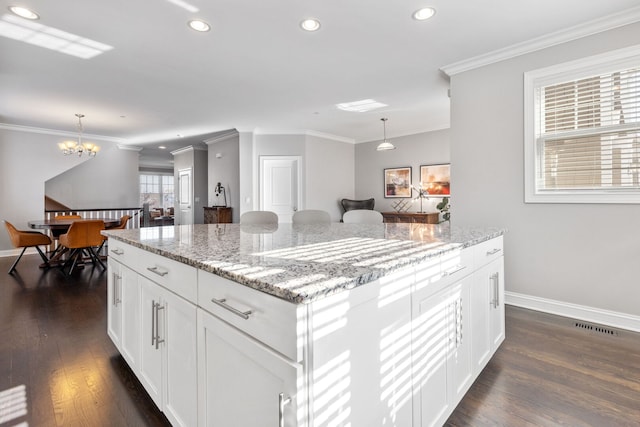 104 W Kennedy Ln, Hinsdale, IL 60521 - kitchen with dark wood finished floors, baseboards, a chandelier, ornamental molding, and recessed lighting