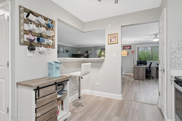 kitchen featuring a sink, light countertops, stainless steel appliances, and white cabinetry