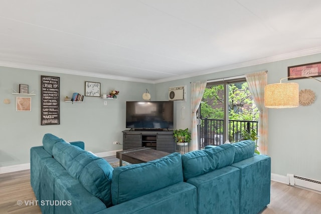 living area with baseboards, ornamental molding, and baseboard heating