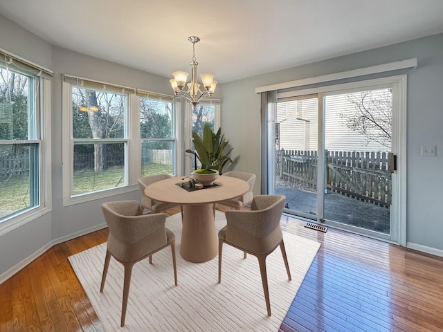 232 Southfield Dr, Vernon Hills, IL 60061 - dining room with a chandelier, hardwood / wood-style flooring, and plenty of natural light