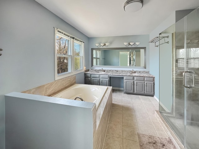 232 Southfield Dr, Vernon Hills, IL 60061 - bathroom featuring double vanity, tile patterned floors, a bath, and a stall shower
