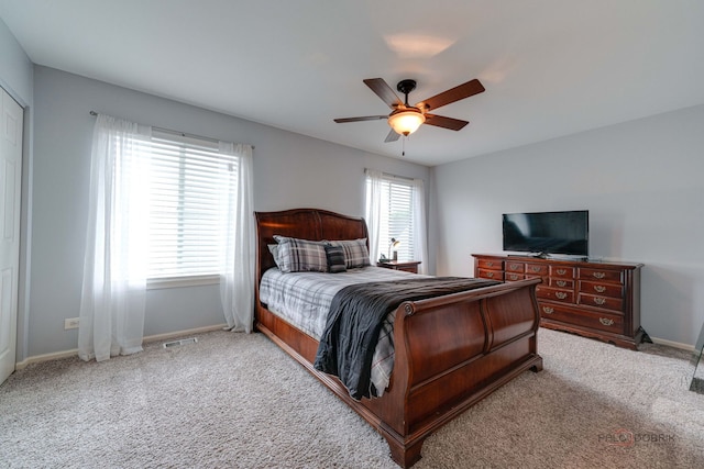4553 W Hill Ave Unit 3, Waukegan, IL 60085 - carpeted bedroom with baseboards and ceiling fan