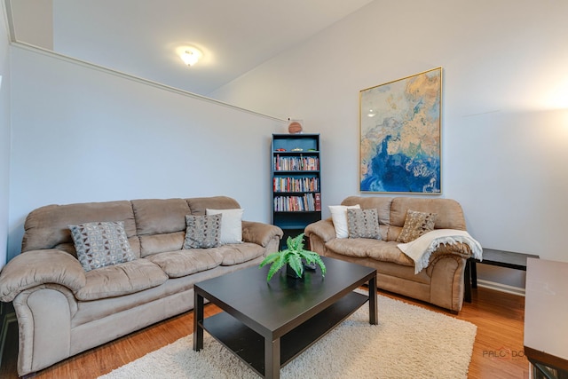 4553 W Hill Ave Unit 3, Waukegan, IL 60085 - living area with lofted ceiling and wood finished floors