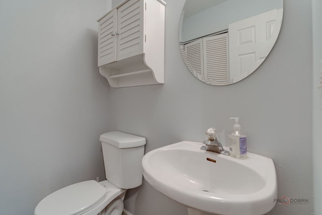 4553 W Hill Ave Unit 3, Waukegan, IL 60085 - half bathroom with a sink and toilet