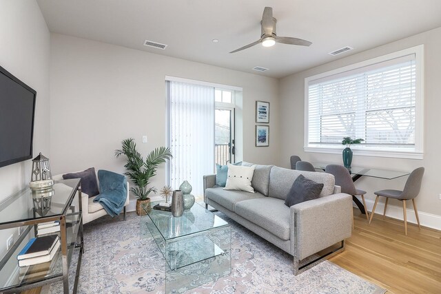 514 Hillgrove Ave Unit 204, Western Springs, IL 60558 - living area with baseboards, visible vents, and light wood finished floors