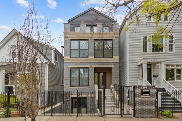 1522 W Wolfram St, Chicago, IL 60657 - view of front of property with brick siding, a gate, and a fenced front yard