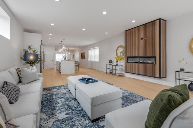 1522 W Wolfram St, Chicago, IL 60657 - living room with recessed lighting and light wood-style flooring