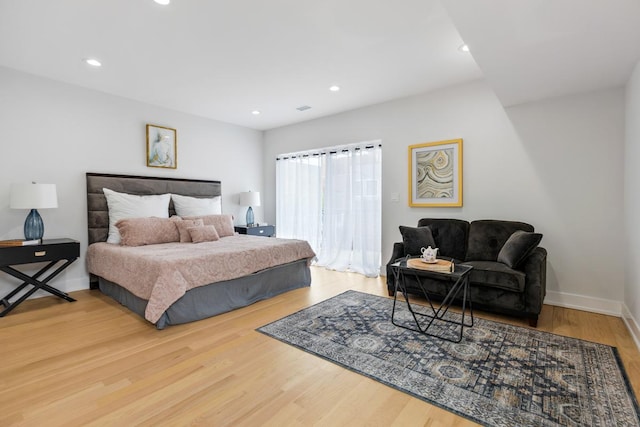 1522 W Wolfram St, Chicago, IL 60657 - bedroom featuring recessed lighting, baseboards, and wood finished floors