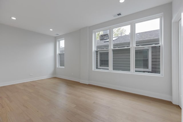 1522 W Wolfram St, Chicago, IL 60657 - unfurnished room with visible vents, recessed lighting, light wood finished floors, and baseboards