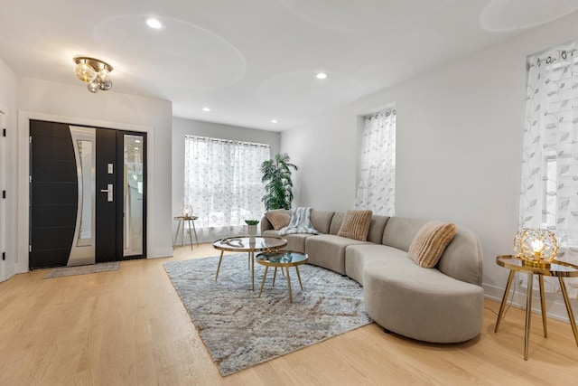 1522 W Wolfram St, Chicago, IL 60657 - living room featuring baseboards, recessed lighting, and wood finished floors