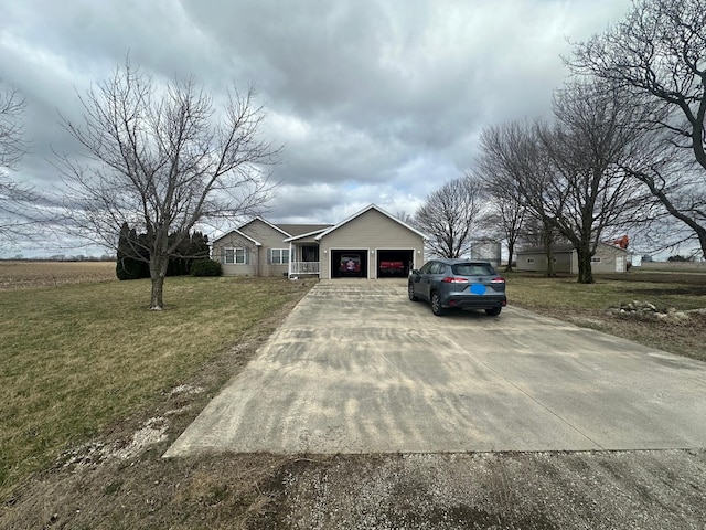 19261 E 2750 N Road, Bismarck, IL 61814 - view of front facade with a front lawn, an attached garage, and concrete driveway