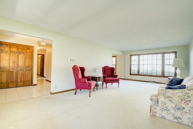 809 S Charles Ave, Naperville, IL 60540 - living area featuring baseboards and light carpet