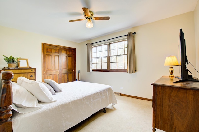 809 S Charles Ave, Naperville, IL 60540 - bedroom with a closet, visible vents, light carpet, baseboards, and ceiling fan