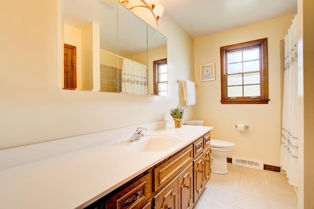 809 S Charles Ave, Naperville, IL 60540 - bathroom featuring visible vents, vanity, toilet, baseboards, and tile patterned floors