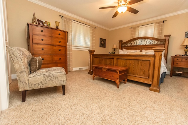 bedroom with light carpet, crown molding, and a ceiling fan