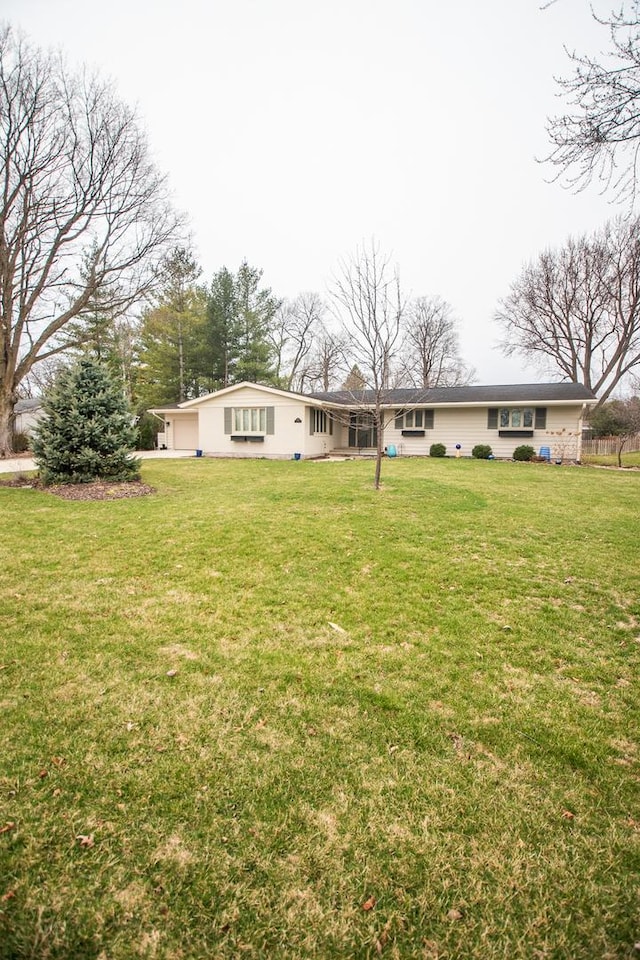 exterior space with a front lawn