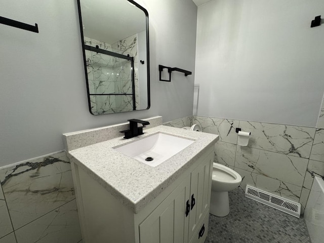 bathroom with toilet, vanity, a marble finish shower, marble finish floor, and visible vents