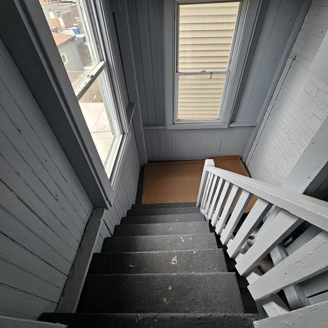 2251 S Kirkland Ave, Chicago, IL 60623 - staircase featuring wood walls