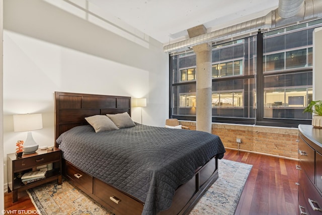 bedroom with wood-type flooring