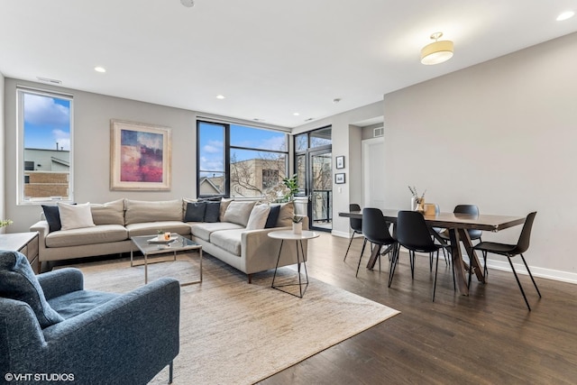 1841 N California Ave Unit 3A, Chicago, IL 60647 - living room with wood finished floors, baseboards, and recessed lighting