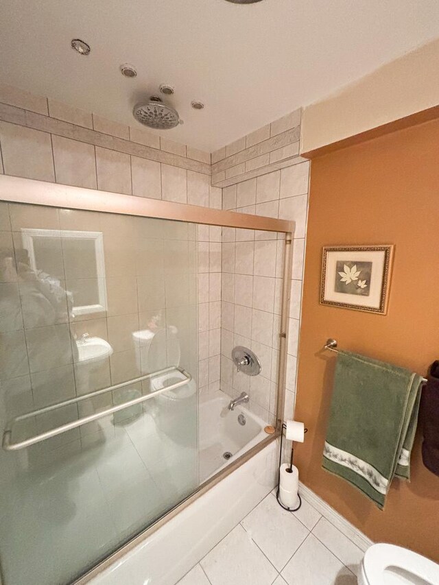 5500 Lincoln Ave Ave Unit 118E, Morton Grove, IL 60053 - full bath with tile patterned floors and bath / shower combo with glass door