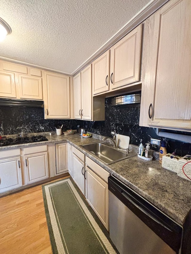 5500 Lincoln Ave Ave Unit 118E, Morton Grove, IL 60053 - kitchen featuring stainless steel dishwasher, black gas cooktop, range hood, a textured ceiling, and backsplash