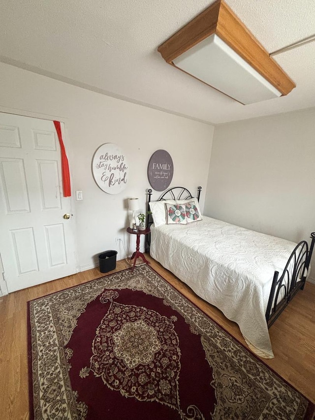 5500 Lincoln Ave Ave Unit 118E, Morton Grove, IL 60053 - bedroom featuring wood finished floors