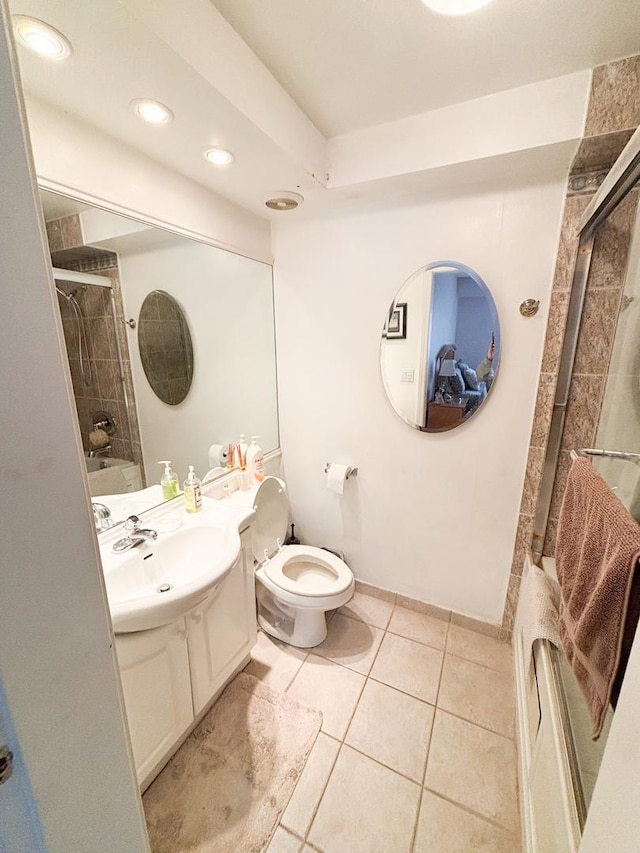 5500 Lincoln Ave Ave Unit 118E, Morton Grove, IL 60053 - bathroom with a tile shower, tile patterned floors, vanity, and recessed lighting