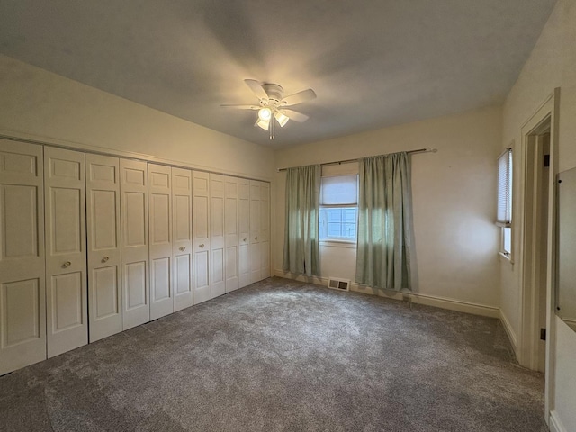 529 Pearl St, Ottawa, IL 61350 - unfurnished bedroom featuring a closet, carpet, baseboards, and visible vents