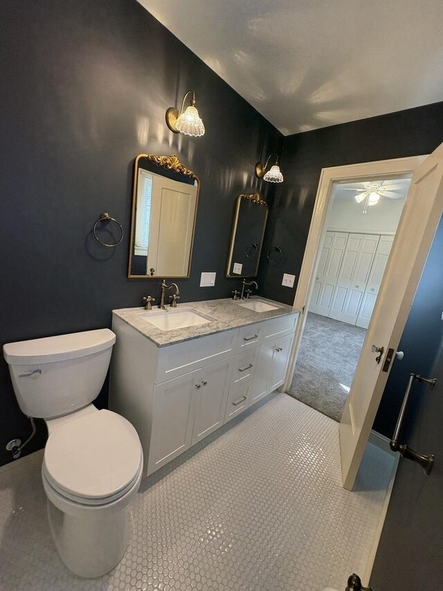 529 Pearl St, Ottawa, IL 61350 - bathroom with double vanity, toilet, a sink, and tile patterned floors