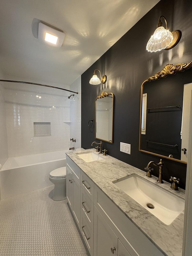 529 Pearl St, Ottawa, IL 61350 - bathroom featuring a sink, tile patterned floors, toilet, and washtub / shower combination