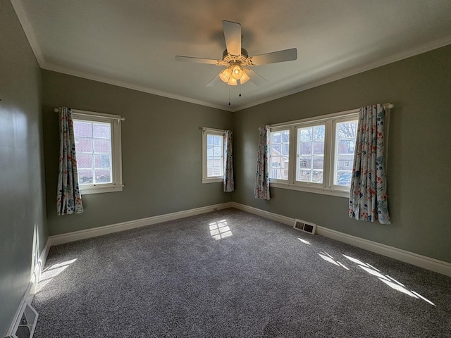 529 Pearl St, Ottawa, IL 61350 - unfurnished room featuring visible vents, carpet, crown molding, baseboards, and ceiling fan