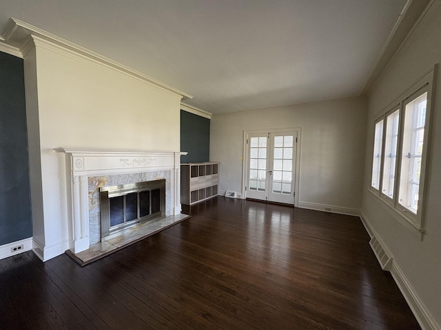529 Pearl St, Ottawa, IL 61350 - unfurnished living room with crown molding, a healthy amount of sunlight, a premium fireplace, and dark wood finished floors