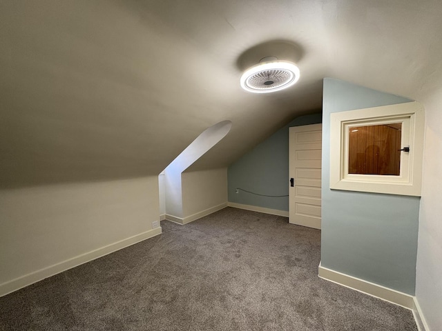 529 Pearl St, Ottawa, IL 61350 - additional living space with baseboards, vaulted ceiling, and carpet floors