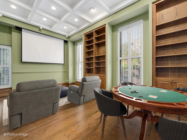recreation room with coffered ceiling, wood finished floors, beam ceiling, and recessed lighting