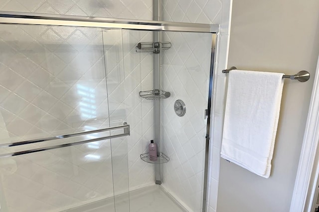 bathroom featuring a stall shower