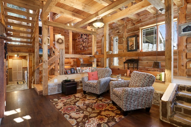 2655 County Road 550 E, Mahomet, IL 61853 - interior space featuring log walls, beam ceiling, wooden ceiling, and hardwood / wood-style floors