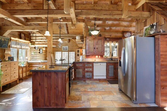 2655 County Road 550 E, Mahomet, IL 61853 - kitchen featuring a sink, stainless steel appliances, a peninsula, and a wealth of natural light