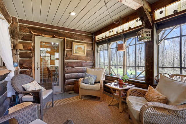 2655 County Road 550 E, Mahomet, IL 61853 - sunroom with plenty of natural light, wooden ceiling, recessed lighting, and rustic walls